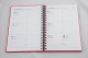 Agenda B5 (17 x 24 cm) datata 2023 pentru programari, coperta rosie, legare cu spira metalica. Poza 1513
